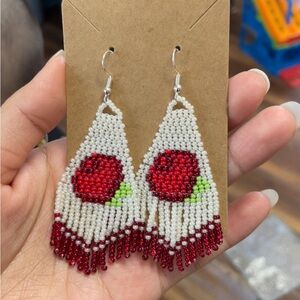 Cranberry indigenous beaded earrings. Handmade by myself